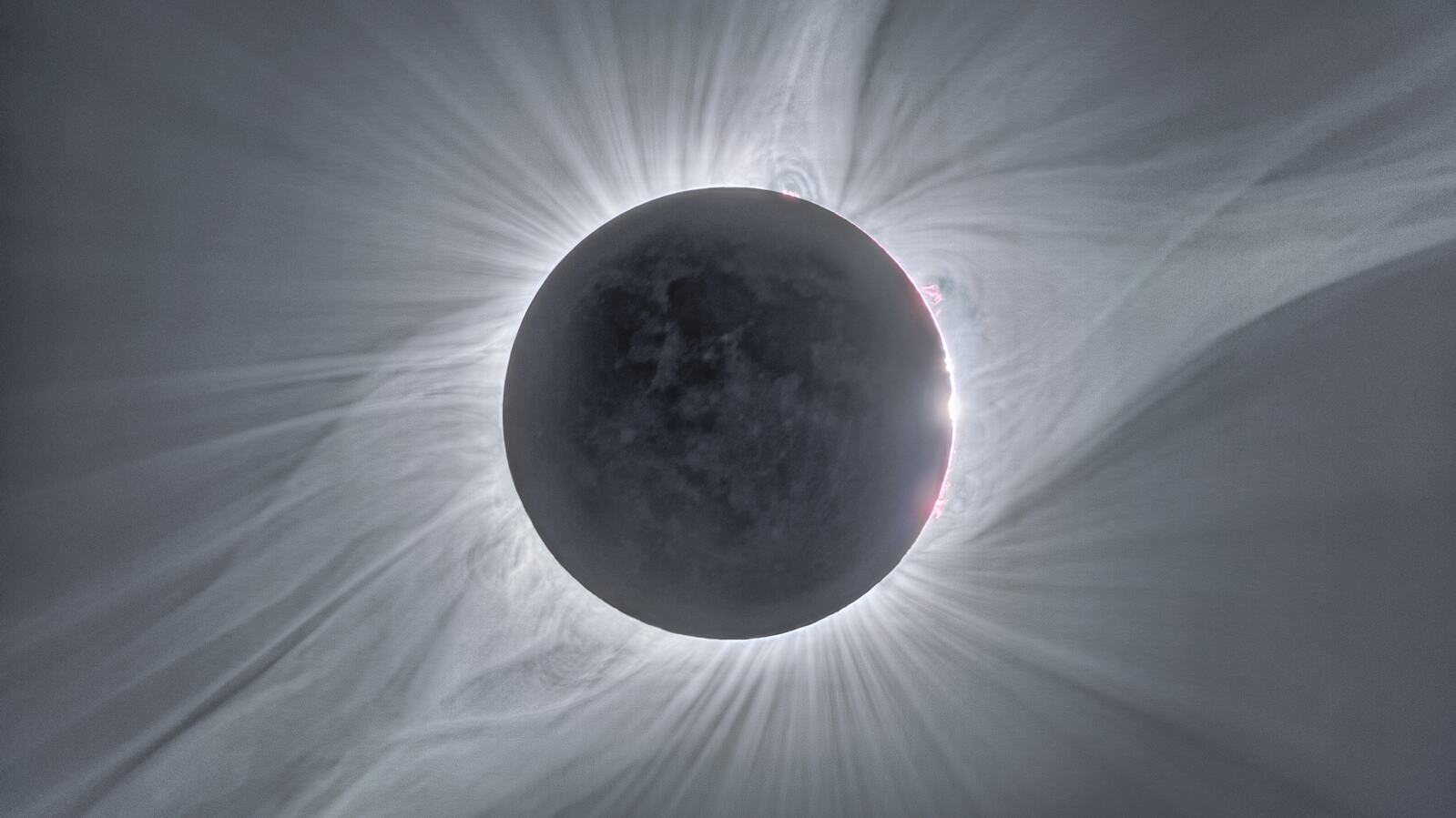 The Sun's corona fully surrounding the Moon during totality