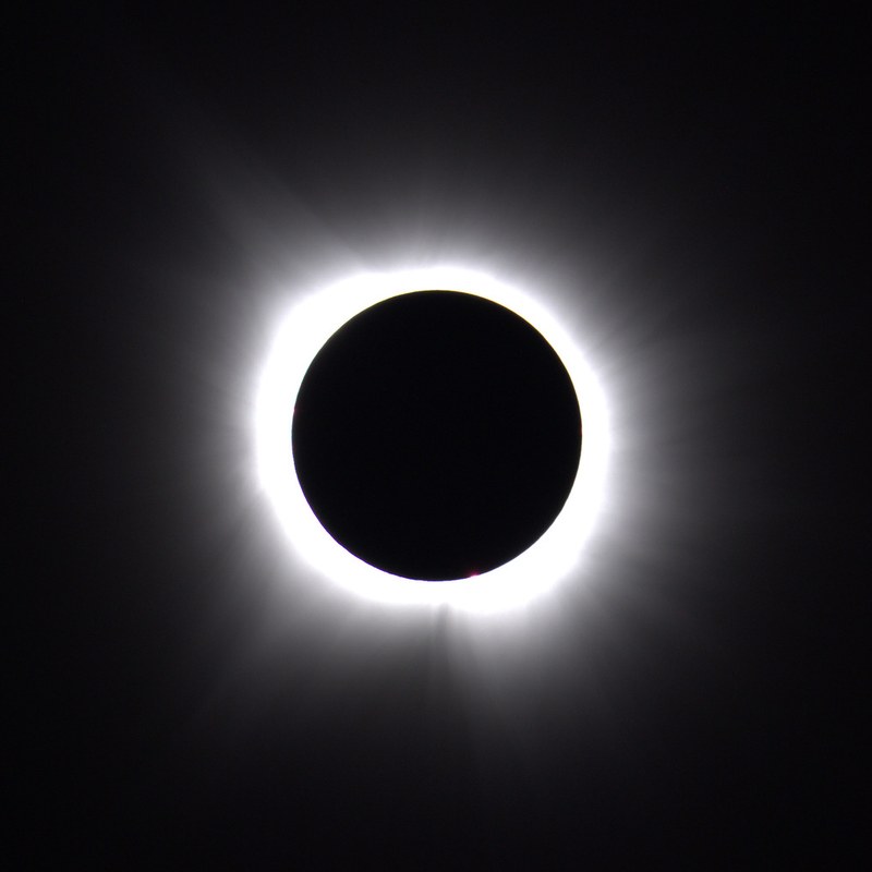 A single unmodified frame from Canon EOS R5 — the corona barely visible
