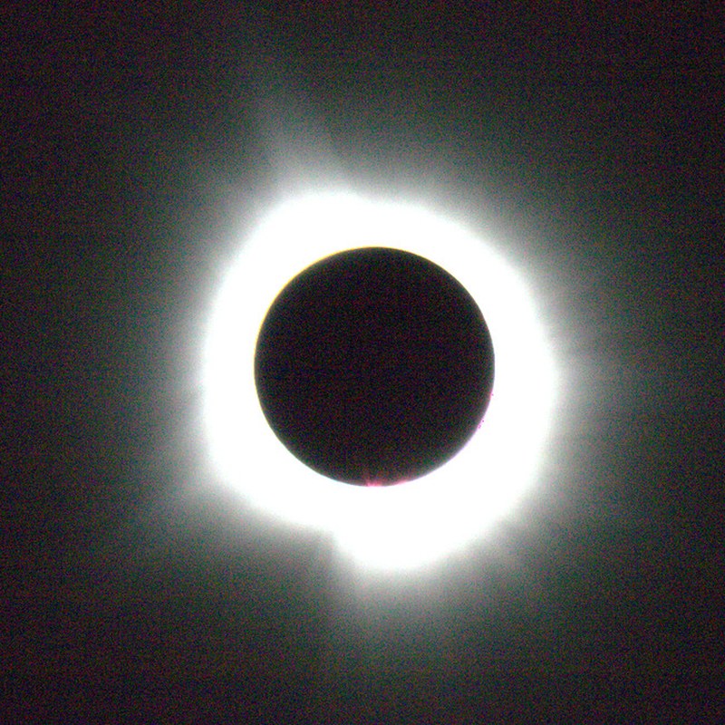 A single unmodified frame from Canon EOS 750D — the corona barely visible