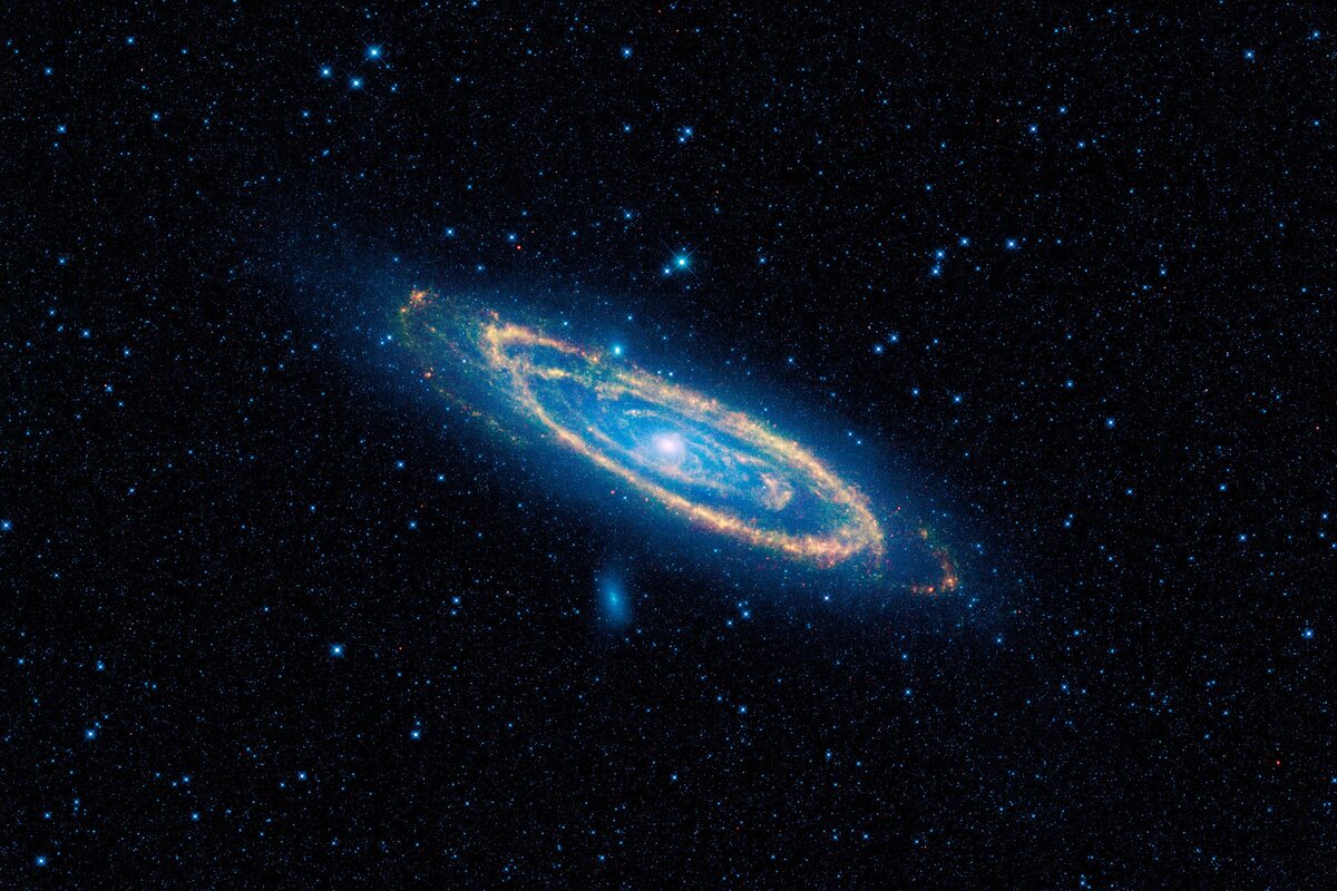 The Andromeda Galaxy's spiral disc against a dark sky