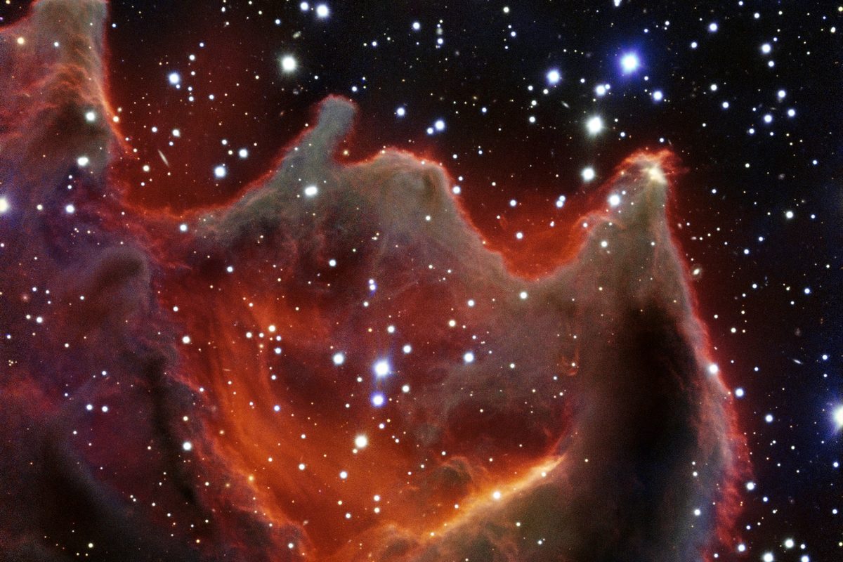The faint cometary globule CG4 against a dense star field