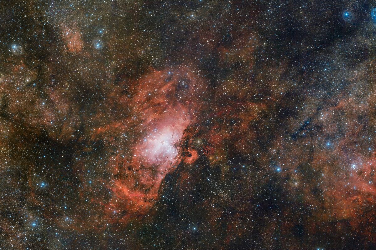 The Eagle Nebula's pillars in a wide deep-sky mosaic combined from many exposures